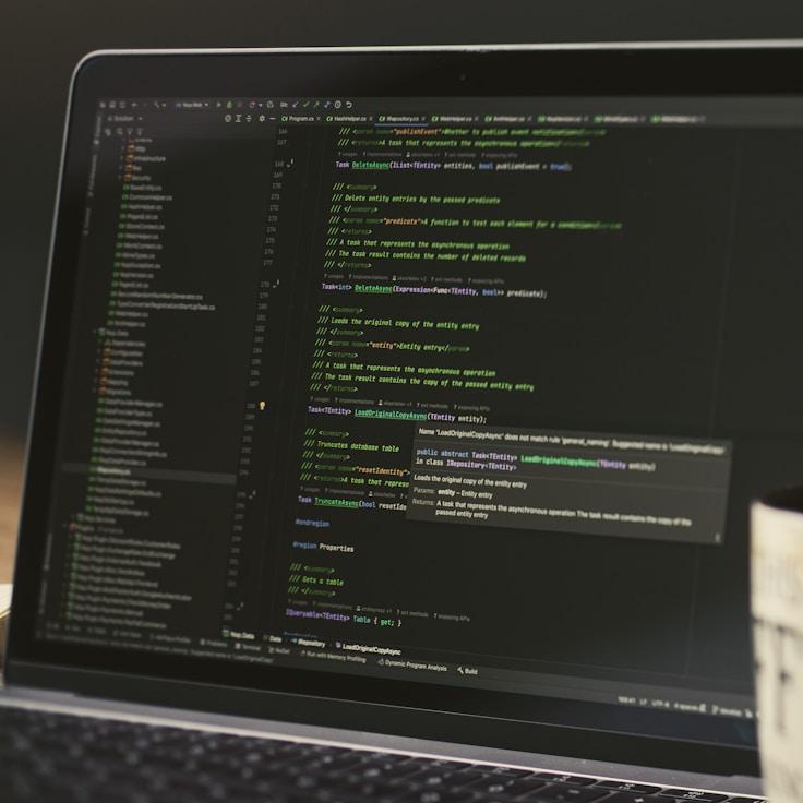 Mobile app project planning workspace with devices and development tools